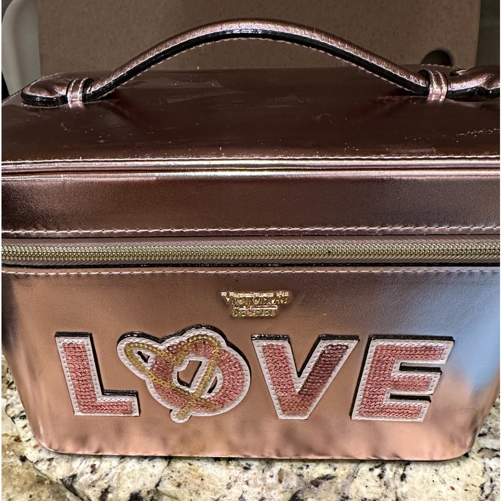 NWOT Metallic rose gold Victoria secret train case. Accepting offers.